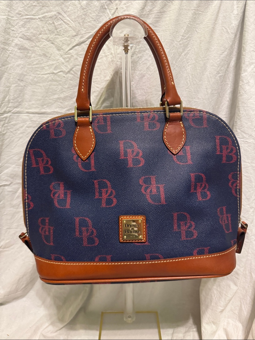 Dooney & Bourke Navy Satchel with Brown Trim and Red Logo